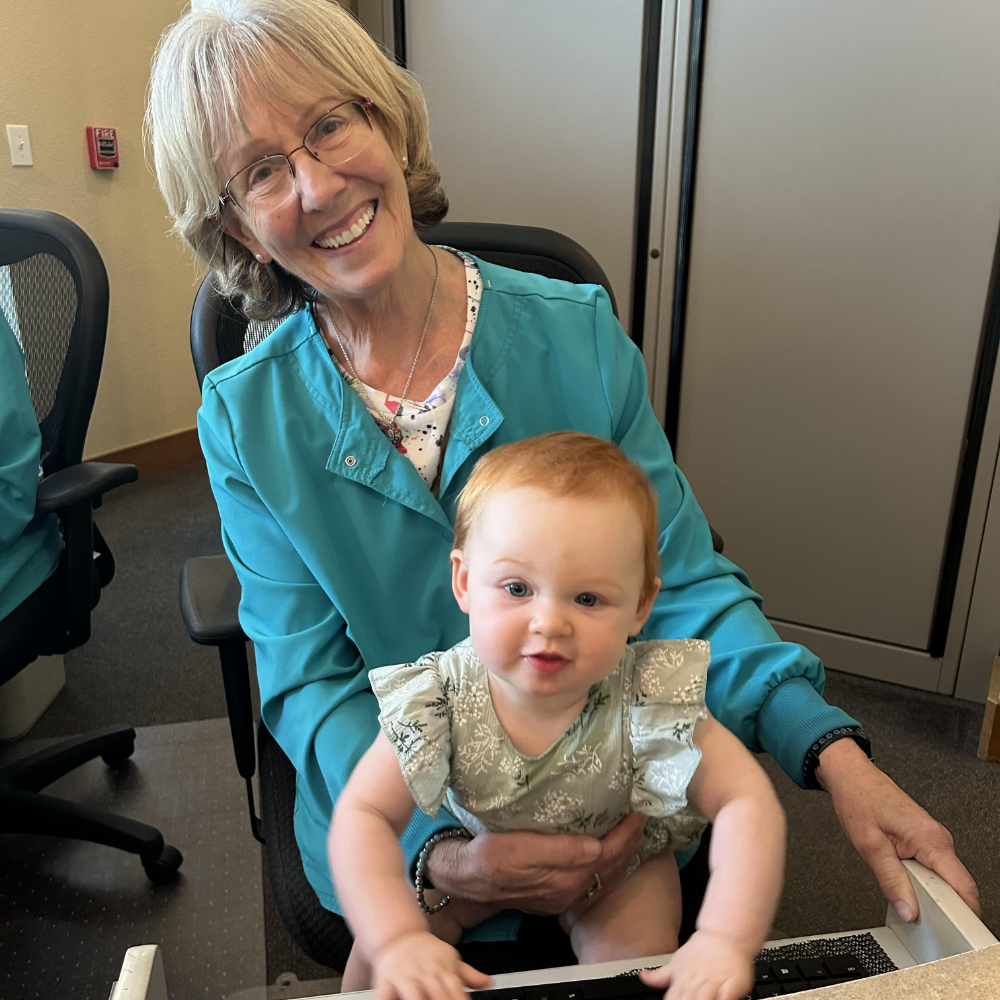 Karen smiling with baby